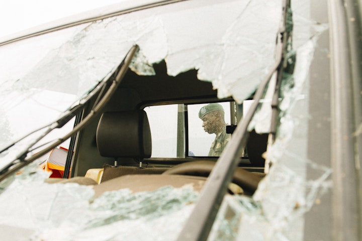 A FARDC soldier on a pick up truck that was hit by an attack from Mai Mai rebels.