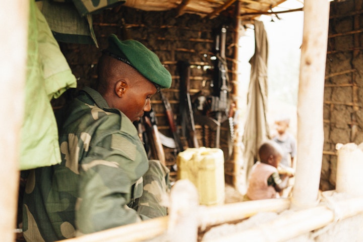 Life conditions in a FARDC base. The wives and children of the soldiers live in the base and risk to be involved in battles and attacks.