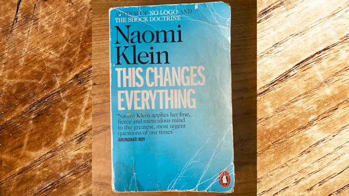 Naomi Klein argues that the climate crisis cannot be addressed in the current era of neoliberal market fundamentalism, which encourages profligate consumption and has resulted in mega-mergers and trade agreements hostile to the health of the environment.
