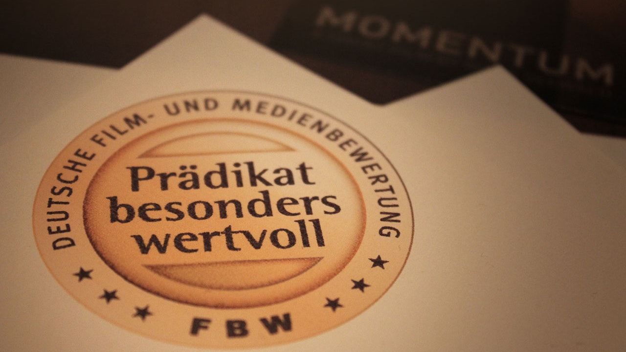 Momentum - Momentum receiving the certification mark “Especially Valuable” from the German Film and Media Evaluation Institute