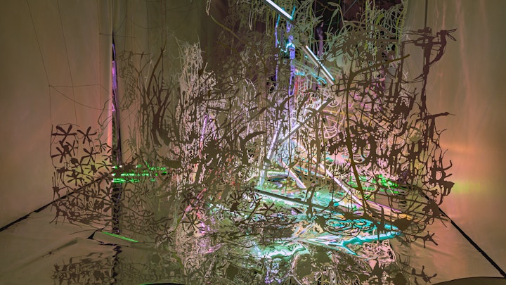 Great River Mashup was a site-specific art installation by artist Chris Natrop - size variable | water color, glitter and iridescent medium on cut paper, magic string, fluorescent lighting fixtures with colored gel overlays, LED light panels, reflective Mylar | 2011