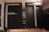 FITC Signage 2014 - Two of the signs with lights off. We like the matte black look and how the font appears somewhat 3D coming off of the wood.