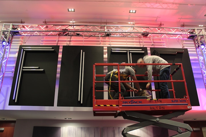 FITC Signage 2014 - Hanging the signs from a truss, installing power and DMX controller/connection.